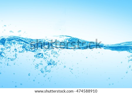 water,water splash  isolated on blue background,beautiful splashes a clean water

