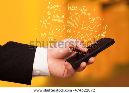 Hand holding smartphone with business scheme on it