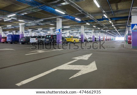 A subterranean car park in a shopping mall
