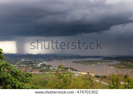 Chiang Saen, Thailand. Beautiful view of Mekong river from the temple hill before the heavy rain. The Golden Triangle area - border between Thailand, Myanmar (Burma) and Laos.