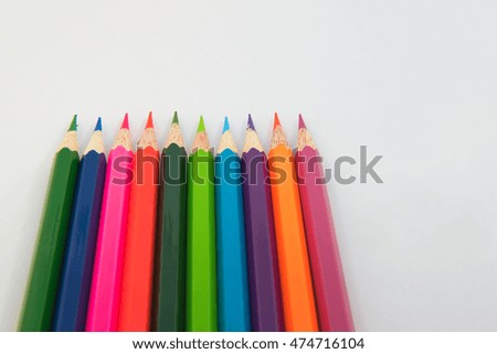 Colors pencils, colorful many crayons on white background.