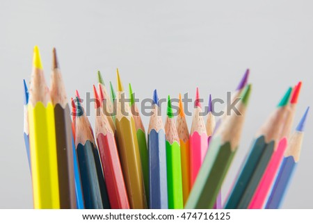 Colors pencils, colorful many crayons on white background.