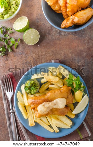 Fish and chips, homemade delicious with pesto from peas
