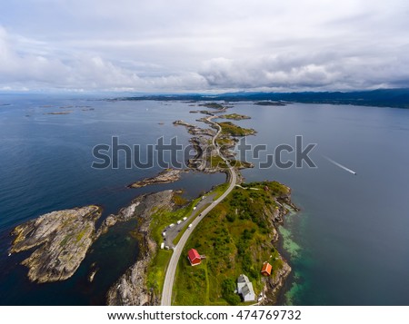 Atlantic Ocean Road or the Atlantic Road (Atlanterhavsveien) been awarded the title as "Norwegian Construction of the Century". The road classified as a National Tourist Route. Aerial photography Royalty-Free Stock Photo #474769732