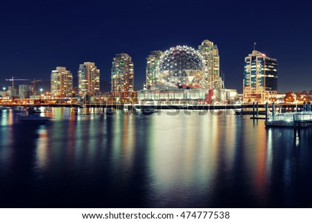 Vancouver city night view with buildings.