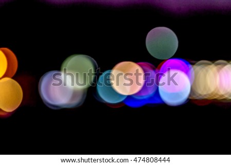 Abstract blur of bright lights lamps stage summer art cafe open area at seaside summer resort. Background for creative design greeting card. Restaurant, coffee shop with beautiful background blur