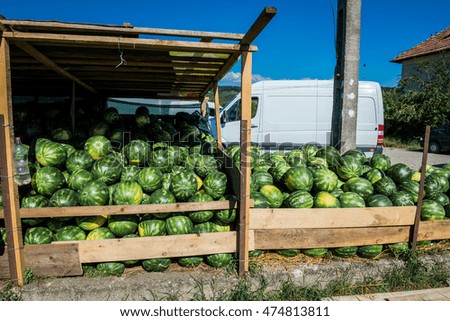 watermelons for sale on a wayside stand in Romania