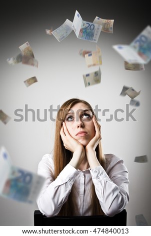 Woman in white and falling Euro banknotes. Currency and lottery concept. Young slim woman.
