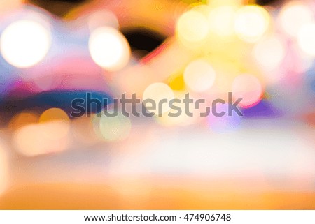 Defocused urban abstract texture background for your design. Multicolored defocused bokeh lights background.