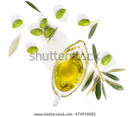 
Top view of sauceboat with olive oil and fresh green olives isolated on white background. Royalty-Free Stock Photo #474939085