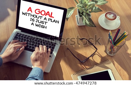 A Goal Without a Plan Is Just a Wish man hand on table Business, coffee, Split tone