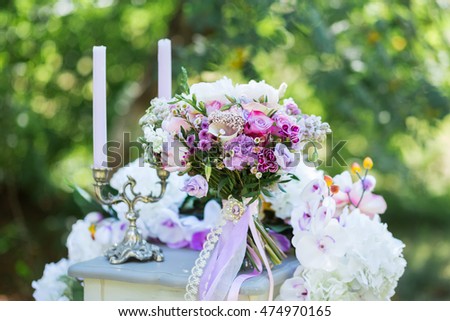 Colorful bridal pastel beautiful bouquet of different flowers. Wedding summer or spring bouquet