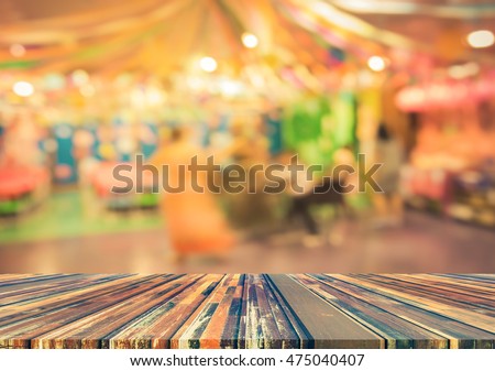 blur image of Tables and decoration prepared for birhtday party for background usage. (vintage tone)