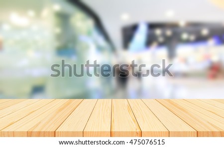 Wood floor and shopping mall blur background, Product display, template.