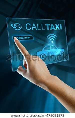 Woman's Hand Booking Taxi on a digital screen