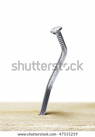 a nail is bent out of shape on a white background Royalty-Free Stock Photo #47515219