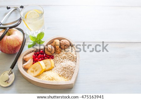 Healthy food in heart and water diet sport lifestyle concept