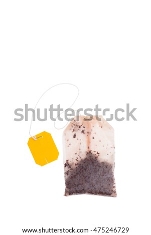 used tea bag on white background isolated Royalty-Free Stock Photo #475246729
