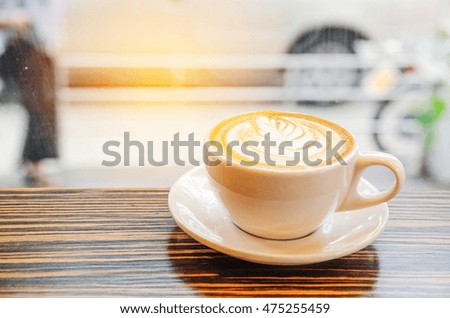 cup of coffee on table in cafe ,Morning light