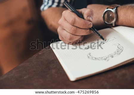 The perfect ring design begins on paper Royalty-Free Stock Photo #475269856