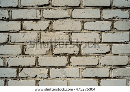 Old wall from a white brick background