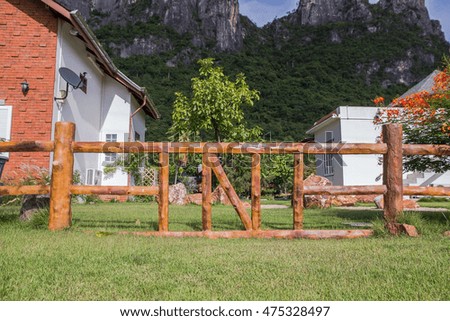 Fence made of cement make it wood at national park,public
