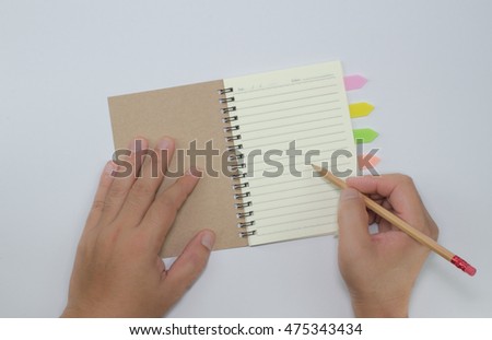Writer recycled paper notebook open front cover on white background