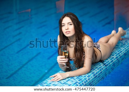 Girl lying near the pool.