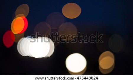 Night road. Blurred lights for abstract color background.