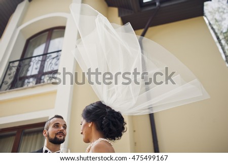 The man looks at veil