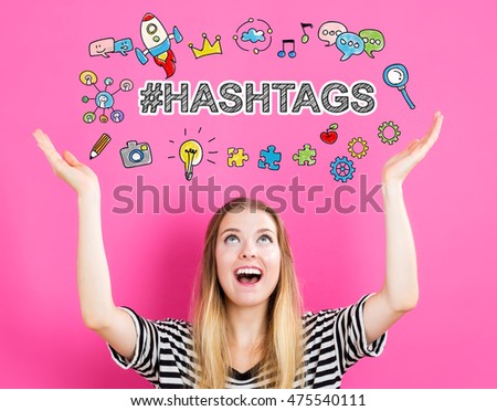 Hashtags concept with young woman reaching and looking upwards
