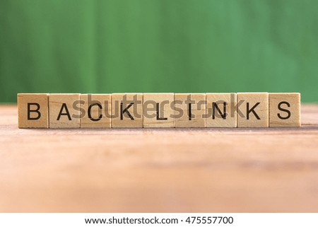 the word of BACKLINKS on wood tiles concept