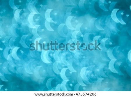Photo of moon and star bokeh light as background. Colorful blurred background.