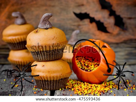 Pumpkin muffins decorated for Halloween celebration selective focus