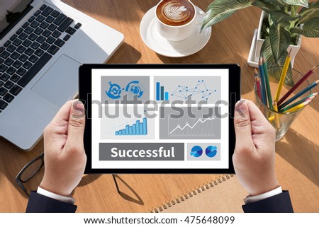 Successful Businessman work  on tablet on screen