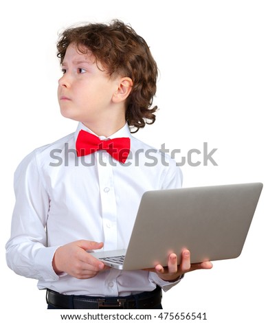 Curly boy in formal suit with laptop