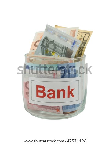Conceptual photo of a bank. Euro and dollar banknotes in a glass jar isolated over white.