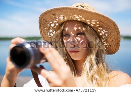 Girl focused on taking a photo