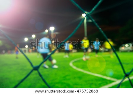 Motion blur of soccer players in a soccer game.