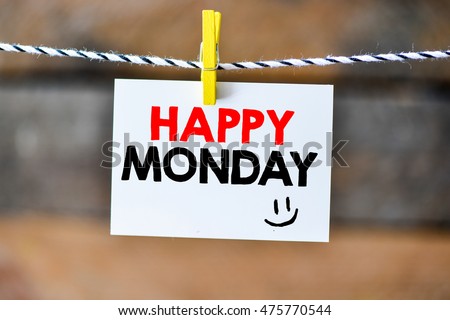 Happy monday.Happy monday on paper hanging on the clothesline. On old wood background