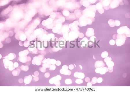 Abstract purple bokeh light background