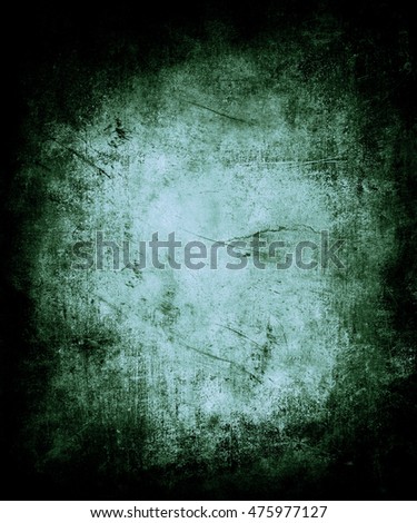 Beautiful abstract grunge vintage scratched texture background with frame and faded central area for your text or picture