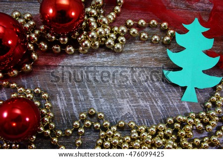 Beautiful celebratory Christmas background. New Year's holidays. Christmas holidays. Beautiful Christmas decorations on the wooden background. For text