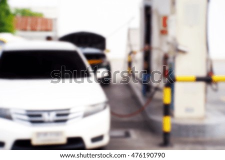 Blurred  background abstract and can be illustration to article of Petrol pump filling