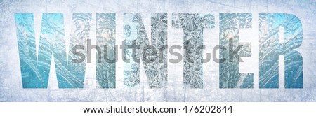 Word WINTER. Frosty pattern on winter glass window. Old paper texture