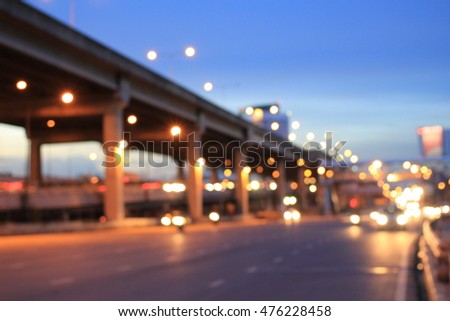 Street lights in speeding car with blue sky, light motion with slow speed shutter