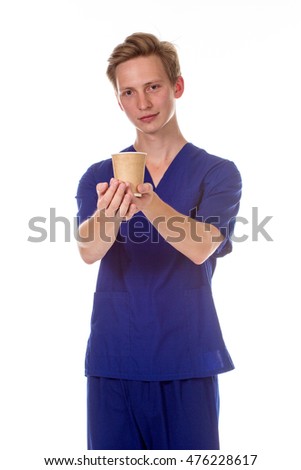 Doctor giving a cup of tea, isolated on white background
