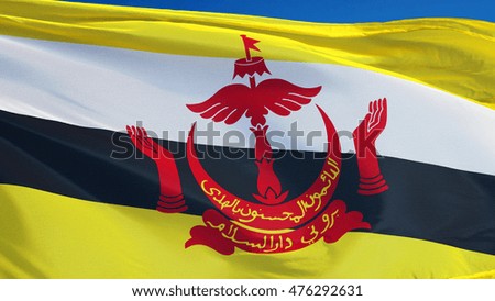 Brunei flag waving against clean blue sky, close up , isolated with clipping mask alpha channel transparency