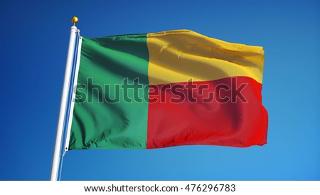 Benin flag waving against clean blue sky, close up, isolated with clipping mask alpha channel transparency