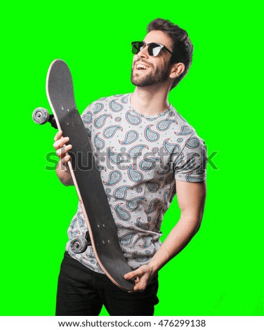 young man holding a skate